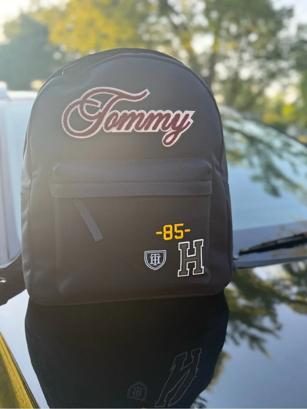 Tommy Hilfiger Black Backpack with Maroon Script Patch